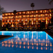 The exterior of La Mamounia Hotel and its pool.
