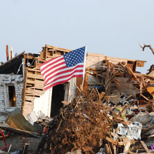 An American flag flies in Joplin, Missouri, after an EF5 tornado recently destroyed huge areas of the city.